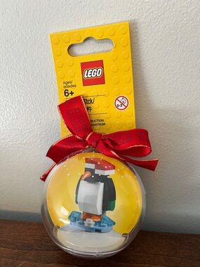 LEGO Yellow Packaged Penguin Ornament with Red Ribbon, NWT